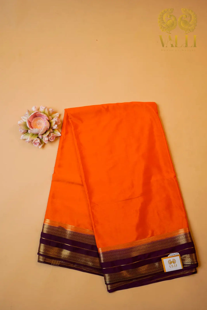 Semi Crepe Silk Orange Saree with Purple Contrast Border & Gold Stripe Pallu
