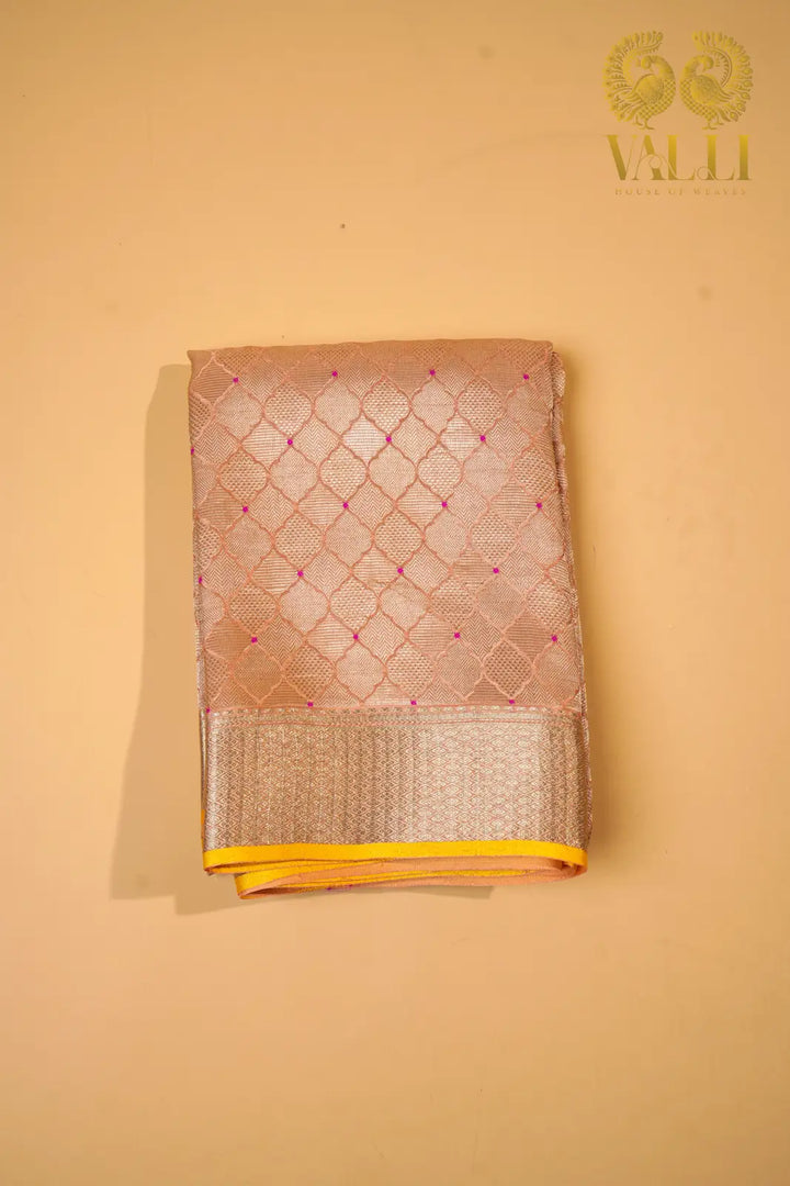 Pastel Peach Banarasi Crepe Silk Saree with Yellow Selvage‘